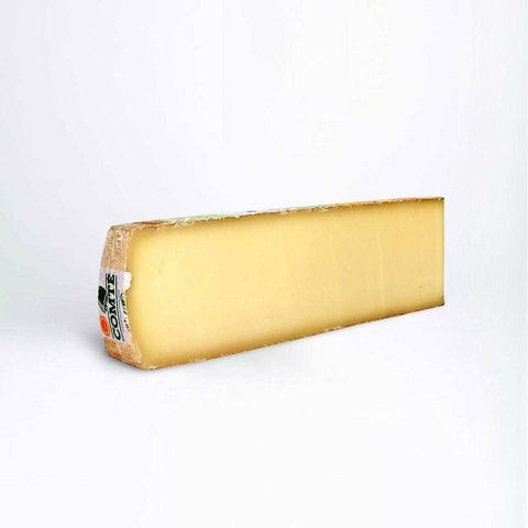 queso Comté está hecho a base de leche cruda de vaca con 24 meses de curación